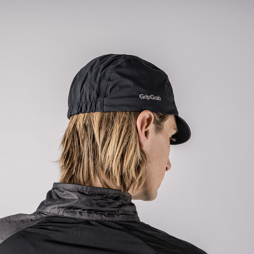Cycling outlet rain cap